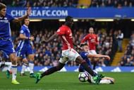 LONDON, ENGLAND - OCTOBER 23: Gary Cahill of Chelsea tackles Eric Bailly of Manchester United during the Premier League match between Chelsea and Manchester United at Stamford Bridge on October 23, 2016 in London, England.  (Photo by Mike Hewitt/Getty Images)